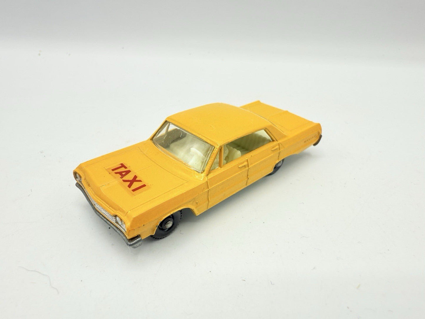 Matchbox Lesney 20c Chevrolet Impala Taxi BPW Unpainted Base - Magic Matchbox