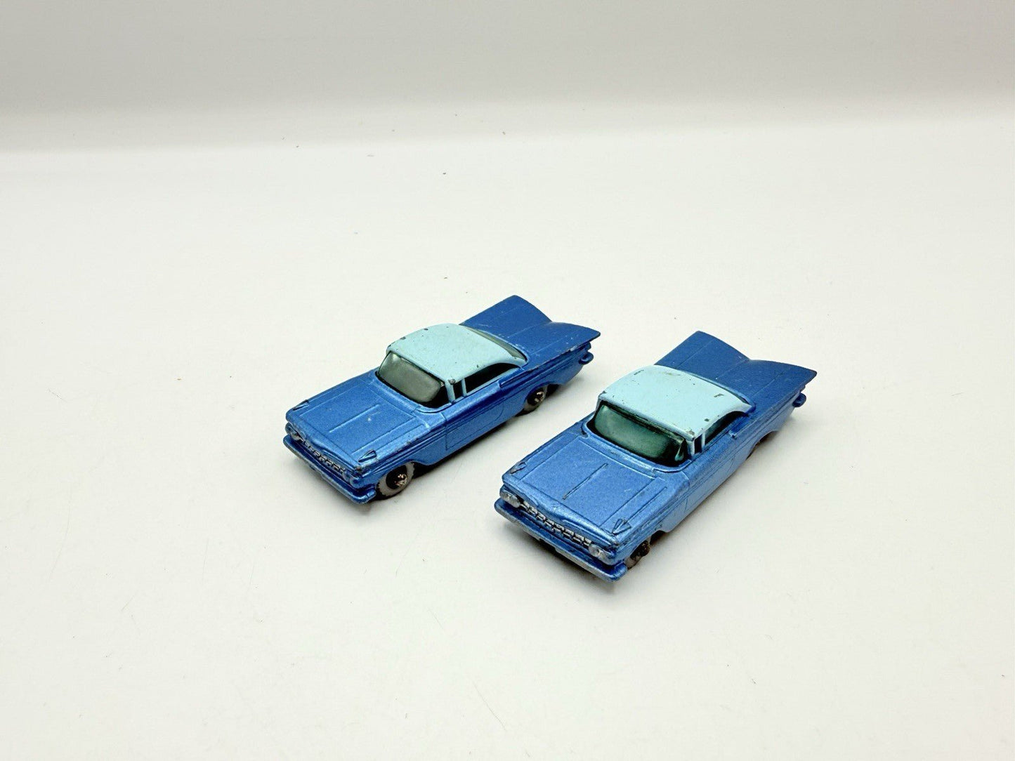 Matchbox Lesney 57b Chevrolet Impala X 2 SPW & Black Base. SPW Blue Base - Magic Matchbox
