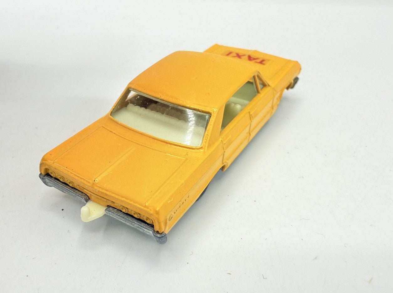 Matchbox Lesney 20c Chevrolet Impala Taxi BPW Unpainted Base - Magic Matchbox
