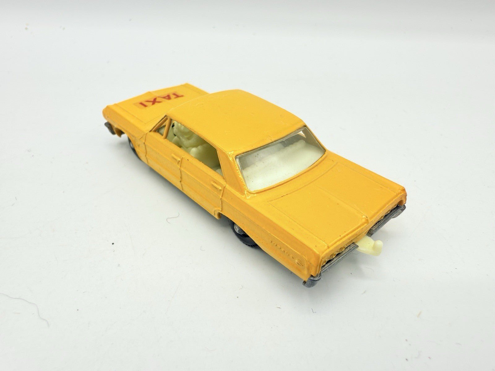 Matchbox Lesney 20c Chevrolet Impala Taxi BPW Unpainted Base - Magic Matchbox