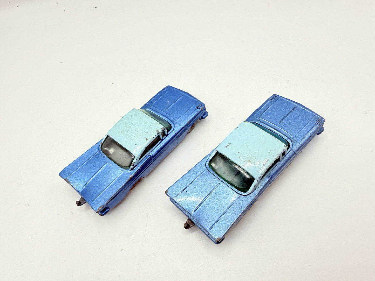 Matchbox Lesney 57b Chevrolet Impala X 2 SPW & Black Base. SPW Blue Base - Magic Matchbox